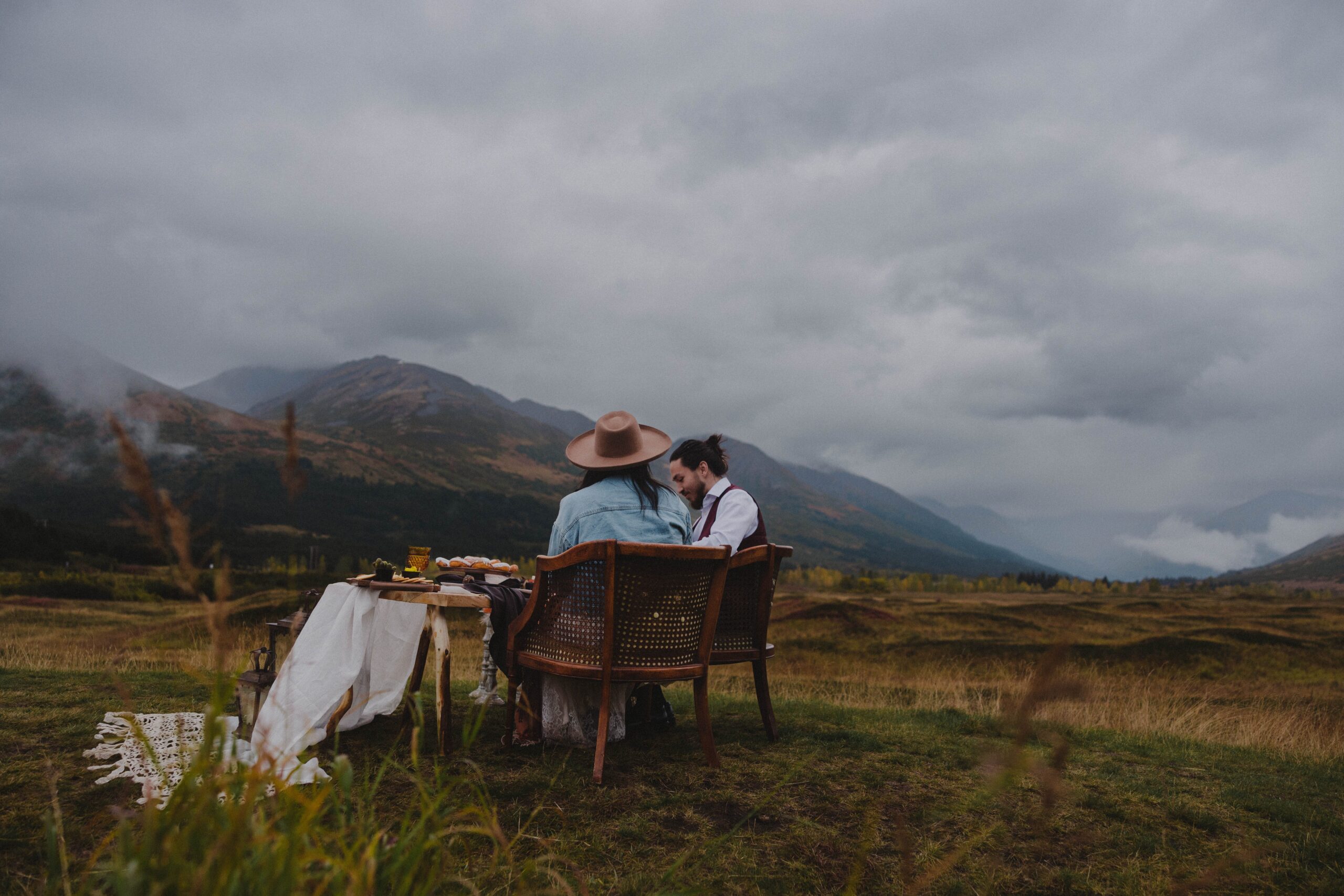 Newlyweds enjoy their elopement lunch surrounded by Turnagain Pass mountain views