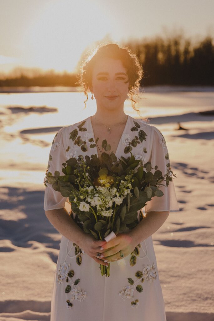 Zoe glows in the buttery light of golden hour at Knik River flats.