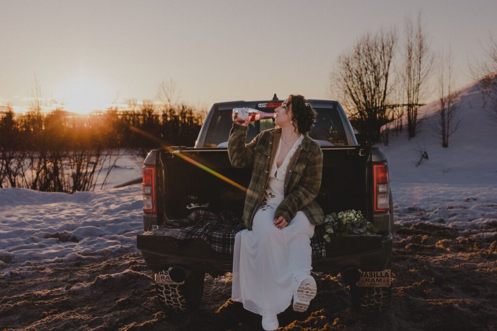 Zoe sipped champagne after popping the cork.